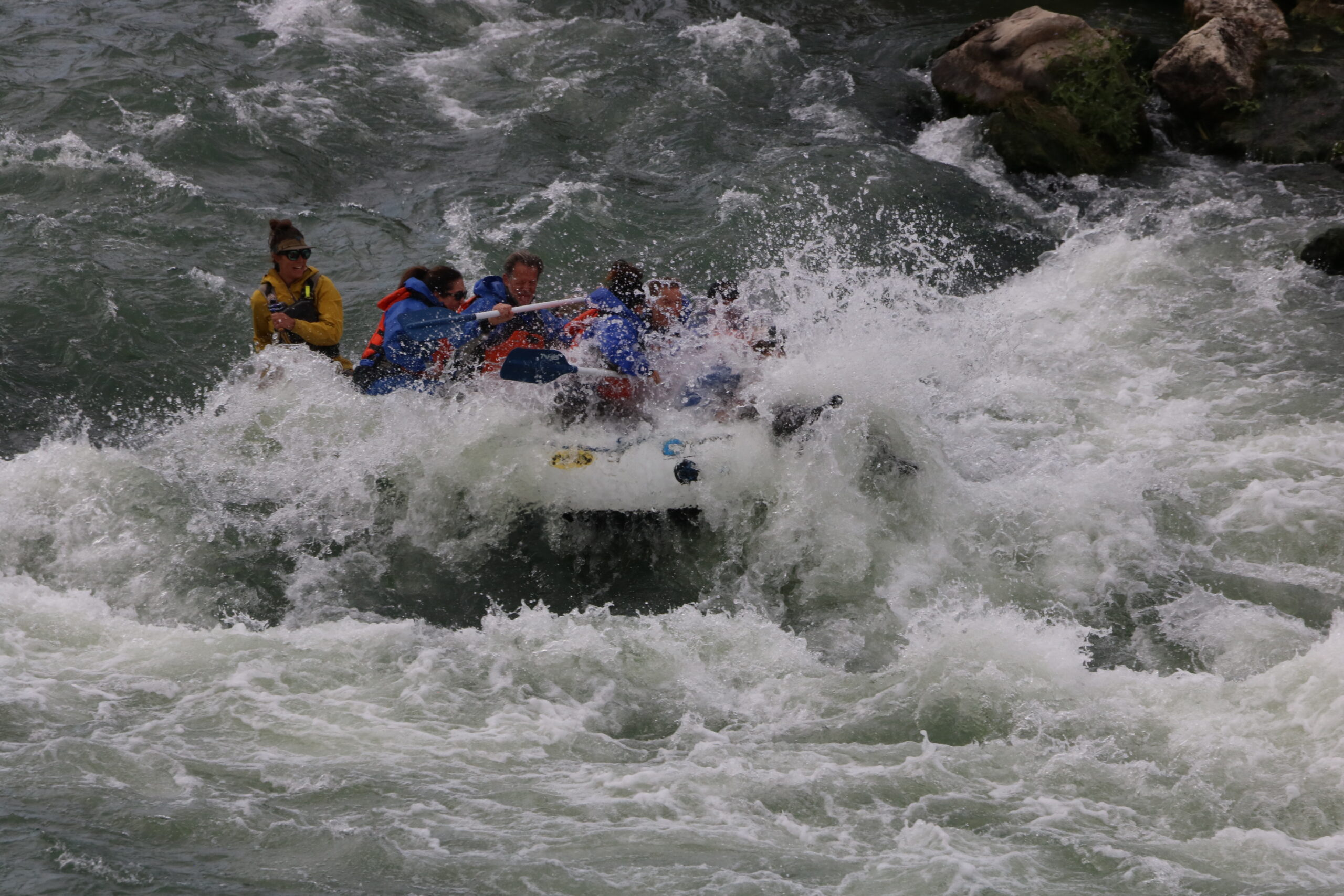 some rapids get bigger in low water, not smaller. Colter Falls on the main Shoshone river near yellowstone in wyoming is one such rapid. Here Wyoming River Trips guides a boat through a massive class III wave train. during mid-summer this rapid is much milder.