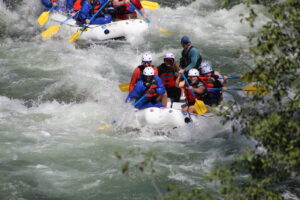 A group rafting trip in Summer on the Shoshone River near Cody Wyoming with Wyoming River Trips. This is a fantastic summer activity for adventurers and a great wildlife viewing opportunity. 